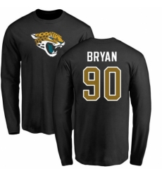 NFL Nike Jacksonville Jaguars #90 Taven Bryan Black Name & Number Logo Long Sleeve T-Shirt
